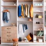 walk in closet with stylish female clothes